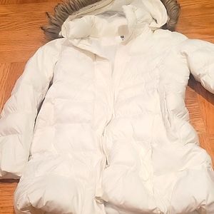 A white coat with a fur hood